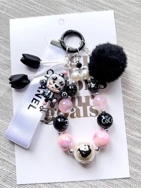 Authentic Chanel Ribbon with Unbranded Black & Pink Pom Pom Beaded Keychain